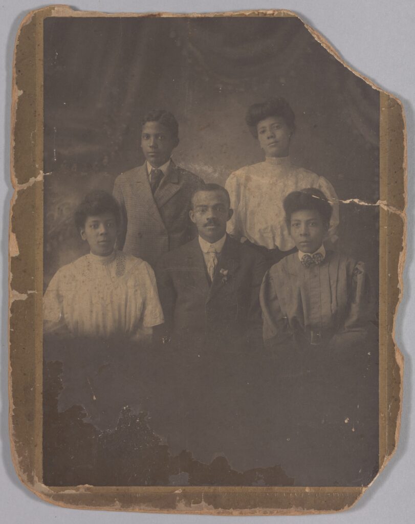 Old photo of African American family.
