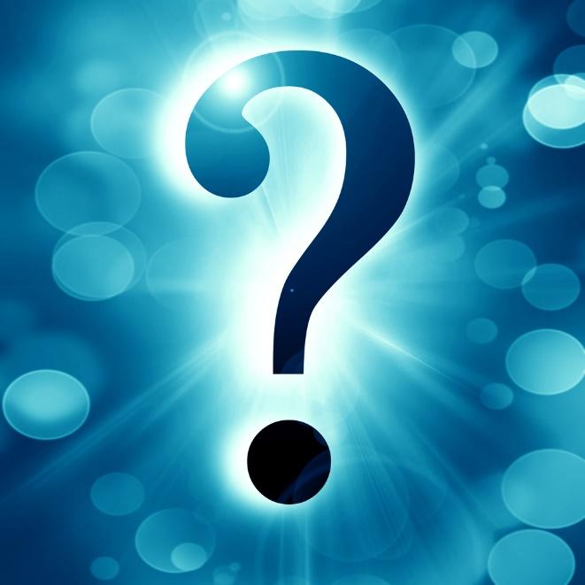 A large dark question mark illuminated by a glowing blue background with light flares and circular bokeh effects, symbolizing curiosity or the search for answers.